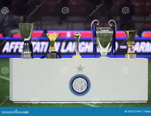 Inter Milan trophies displayed in a glass case